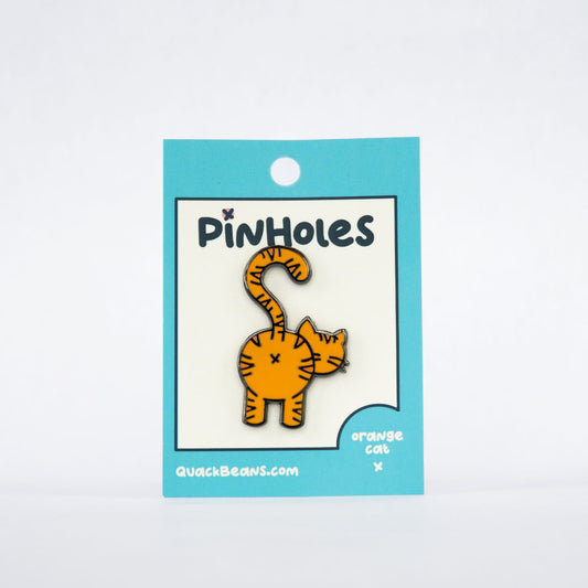 Pinholes | Orange Tabby Cat