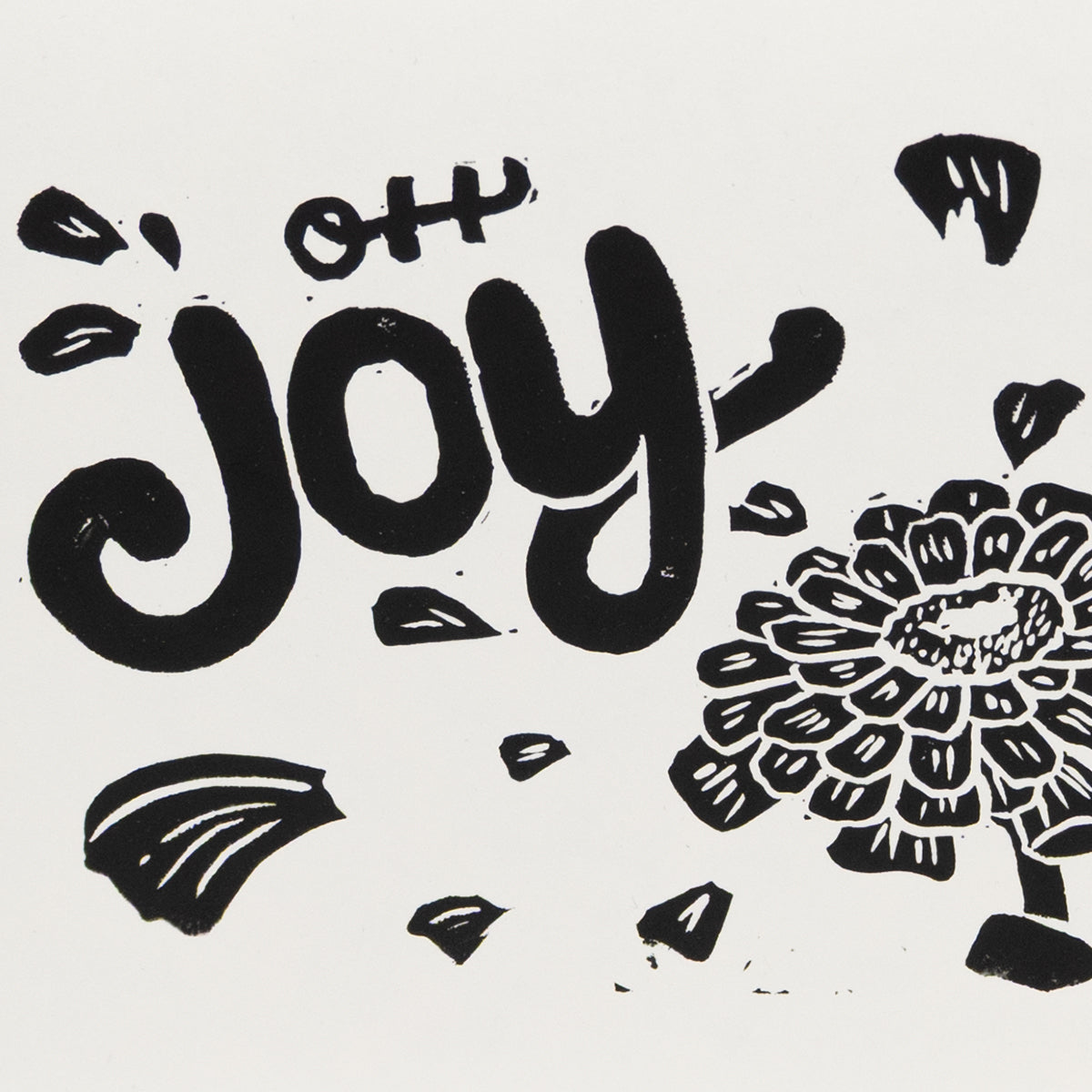 Close up of "Oh Joy" hand lettering with an illustration of a zinnia with petals floating around the text.