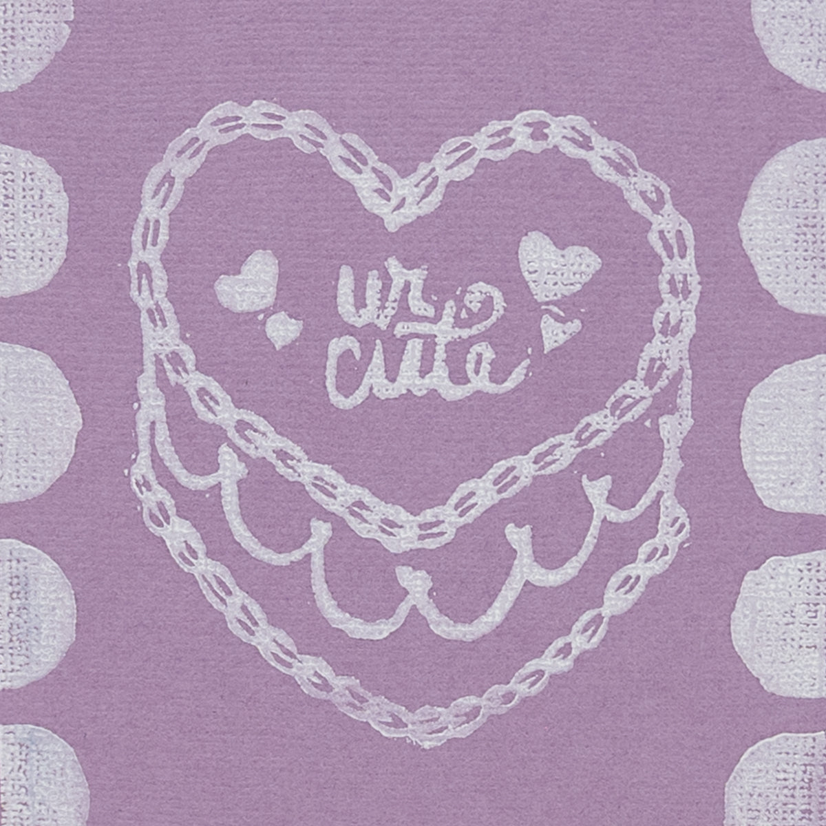 Close up image of "Ur Cute" cake illustration on purple background. 